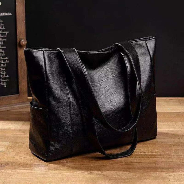 Spacious Leather Tote Bag with Side Pockets