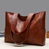 Spacious Leather Tote Bag with Side Pockets