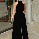 Black Jumpsuit for Women – Halter Neck Wide Leg Design with Abstract Print, Casual and Comfortable 2