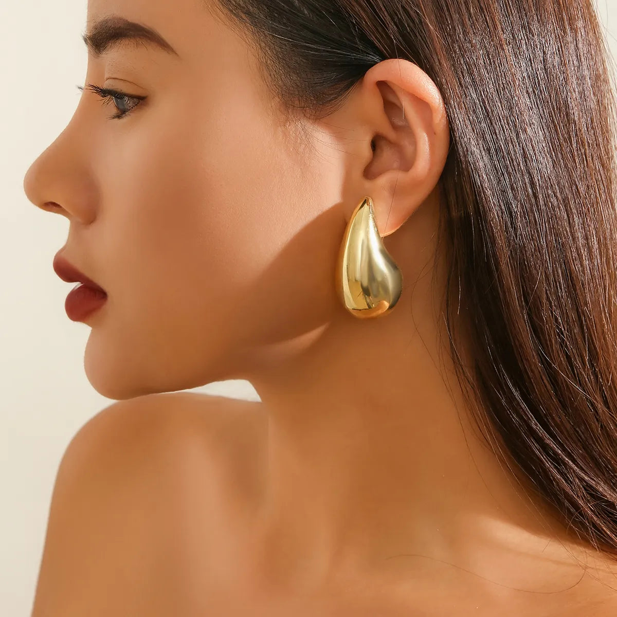 Gold -colored drops earrings 4