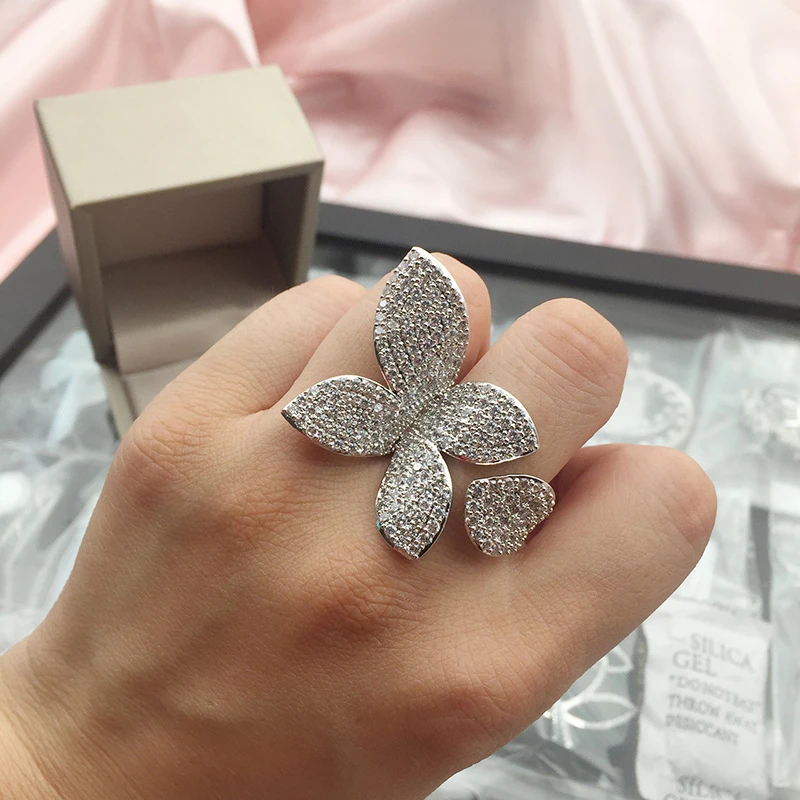 Large, silver -colored, adjustable ring with flower leaf pattern 1