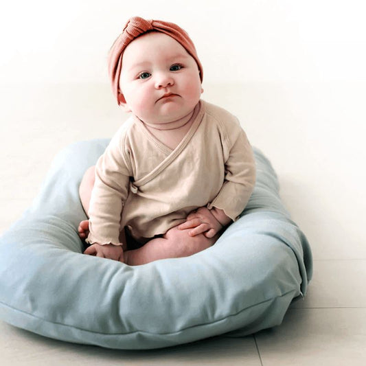 SnuggleNest – Cozy Baby Lounger